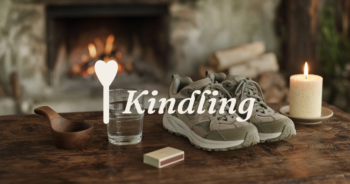 Ember Notes: Mark the skip — an empty wooden hook, a glass of water, a closed matchbox, a lit beeswax candle on walnut, Kindling wordmark and mykindling.app