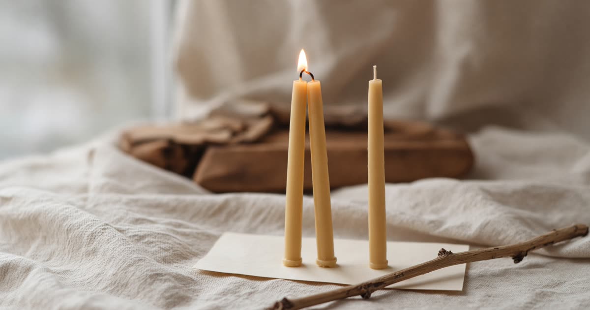 Ember Notes: Stack the twig — three cream tapers in a row on walnut, the first flame lighting the next wick